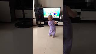 2yearold baby imitates dancing on TV dancing very well funny cutebaby [upl. by Akina826]