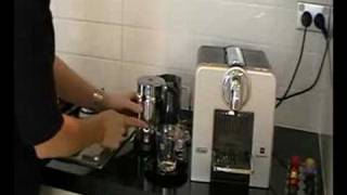 Delonghi Nespresso Coffee Machine Le Cube 185 Demo [upl. by Stochmal]