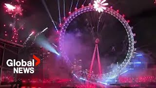 New Year’s 2024 London Eye lit up as city puts on huge fireworks display [upl. by Oretna]