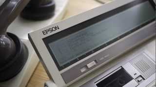 Epson PX8 and Acoustic Coupler CX21 Connecting to Dial up BBS [upl. by Armington498]