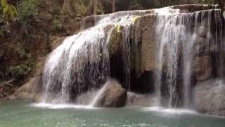 Erawan jungle waterfall Thailand [upl. by Sukcirdor]