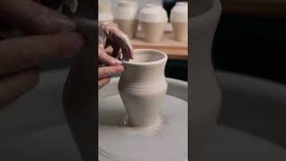 Throwing an Angular Porcelain Vase on the Potters Wheel [upl. by Ethelda271]