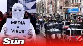 Thousands of antilockdown protesters march in Amsterdam [upl. by Pahl]