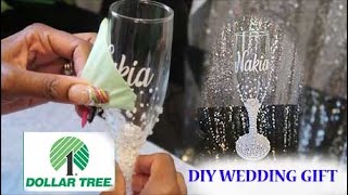 DIY DOLLAR TREE BLING TOASTING FLUTE WEDDING GIFT HOW TO ADD VINYL amp PEARLS TO CHAMPAGNE GLASS [upl. by Oirevas624]