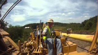 Running live CAT 583k sideboom in PA lowering in 7 joint section [upl. by Virginia]