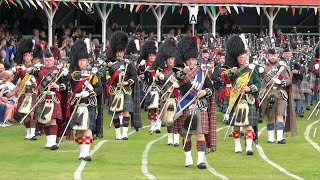 Drum Majors lead the massed Pipes amp Drums marching at the 2022 Braemar Gathering Highland Games [upl. by Marna561]