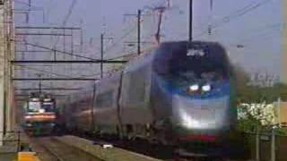 Neck and Neck Acela Express races Amtrak Metroliner Amtrak Northeast Corridor Croydon PA May 1 2001 [upl. by Nudd]