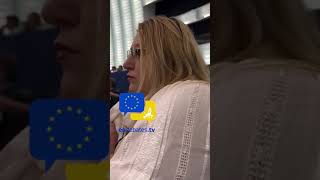 Romanian MEP Șoșoacă kicked out of the European Parliament session with screams icons and a muzzle [upl. by Refynnej335]