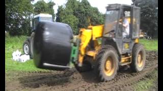 Wrapping silage with JCB [upl. by Alleon]