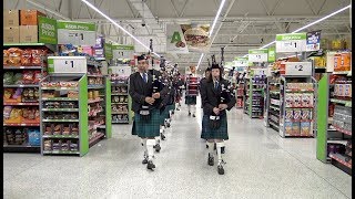 Rare sight as Newtonhill Pipe Band parade through Asda in Portlethen Scotland June 2018 [upl. by Chace]