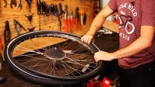 How to Put on New Bike Tire amp Tube  Bicycle Repair [upl. by Kcirdneked452]