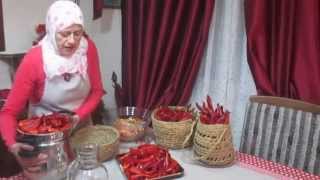 Préparation dHarissa recette Tunisienne طريقة تحضير الهريسة التونسية [upl. by Nylorak]