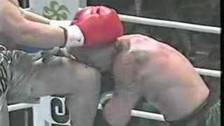 Tom Howard geting a knee to the head from 72quot Giant Choi K1 [upl. by Enoek810]