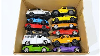 Box full of various miniature cars Peugeot Jaguar Pagani Hyundai Cadillac One Opel DHL [upl. by Idnod851]