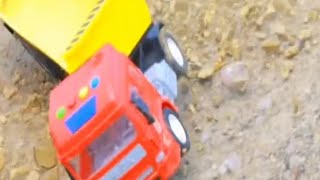 A toy truck carrying goods overturned while passing a dam There are thousands of roadsjcb diy [upl. by Ennoval345]