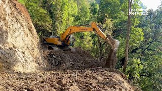 Efficient Techniques for Building Steep Mountain Roads with a Hyundai 22LS Excavator [upl. by Yeltsew]