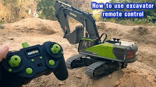 HOW TO USE REMOTE CONTROL EXCAVATOR HUINA 1593 [upl. by Anerom935]