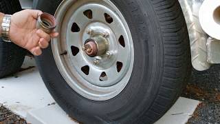 How to grease wheel bearings on a boat trailer [upl. by Land]