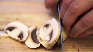 Knife Skills How To Slice Mushrooms [upl. by Anerom]