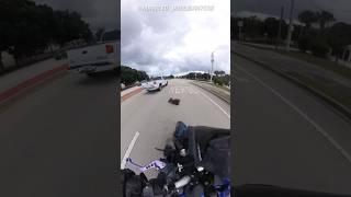 DOG JUMPS OUT OF TRUCK WINDOW TOWARDS BIKER [upl. by Denna988]