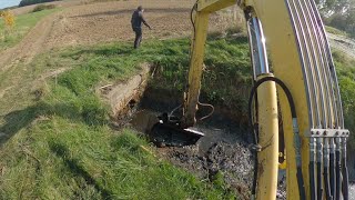 Clearing The Culvert And And Desilting The Drainage Ditch With An Excavator [upl. by Tini]