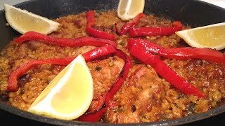 Chicken paella cooked in a skillet [upl. by Zigrang]