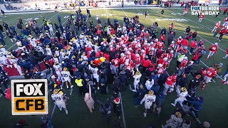 Massive SCUFFLE ensues after Michigan tries to plant flag on Ohio States logo [upl. by Klara]