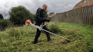 Strimming long wet grass stihl FS411 stihl powerTomstrips [upl. by Ahsaekal747]