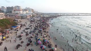 Gaza beaches packed as IsraelHamas ceasefire holds  AFP [upl. by Griffith]