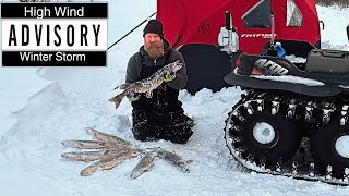 Battling High Winds Ice Camping and Northern Pike Fishing  Catching 30 inch pike [upl. by Nwaf317]