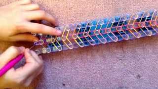 Rainbow loom How to make the XTwister Bracelet [upl. by Naz]