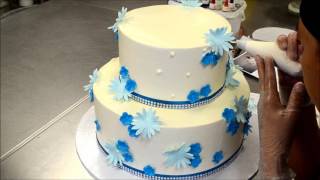 How to Decorate a two tier cake with fondant flowers [upl. by Ier]