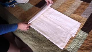 How to Fold The OsoCozy Newborn Prefolds [upl. by Anaehr]