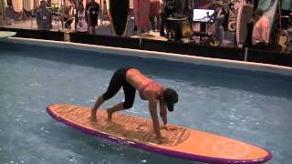 Amazing SUP Yoga demonstration at Surf Expo [upl. by Ominorej12]