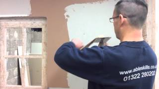 PLASTERING  How to apply the first layer of plaster onto a plasterboard [upl. by Ahsikam706]