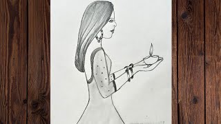 Girl drawing with diya easyhow to draw girl diwali celebratePencil Sketch [upl. by Annaegroeg590]