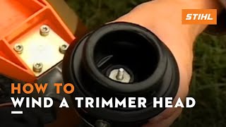 How to Wind a STIHL Trimmer Head  How To [upl. by Aicela]