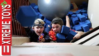 Box Fort Nerf Battle Ethan Vs Cole Nerf Attack in a Crazy Huge Cardboard Box Base [upl. by Leahcimnaes]