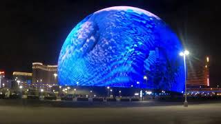 Las Vegas Sphere exterior show Digital blue waves and shapes crash within a floating surf [upl. by Nahgeem]