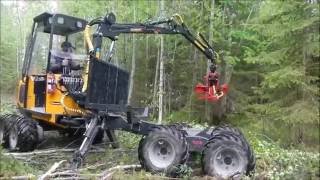 Kinetic 8x8 mini forwarder and Farmikko 200125HT light harvester head [upl. by Wan740]