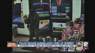 Surveillance camera Man shoots clerk robs 7Eleven [upl. by Ellesor]