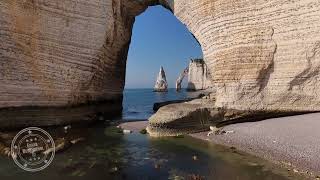 Falaises dEtretat à travers la Manneporte  Drone 4K  FRANCE [upl. by Aikahc]