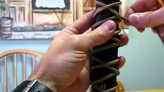 Paracordist How To tie the Turks Head knot PART 3  example Fiskars Camp Hatchet handle [upl. by Aidua]