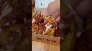 I tried the new bacon and egg cheese bacon sprinkled donut sandwich at duck donuts [upl. by Thordis179]