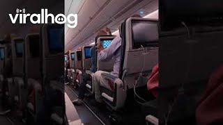 Airline Passenger Upset at Reclined Seat  ViralHog [upl. by Okiman]