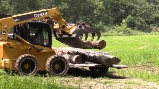 Deere 320 cleans up Logging Mess [upl. by Llertnek]