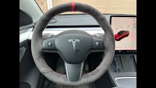 Tesla model Y installing Alcantara steering wheel cover [upl. by Einnel]