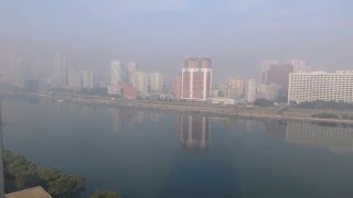 Early morning in Pyongyang filmed from the Yanggakdo Hotel [upl. by Aehs]