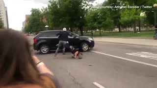 RAW Graphic video shows protester run over in Denver [upl. by Tenom]