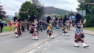 Massed Pipes and Drums marching to the 2022 Braemar Gathering Highland Games in Scotland [upl. by Culbert458]